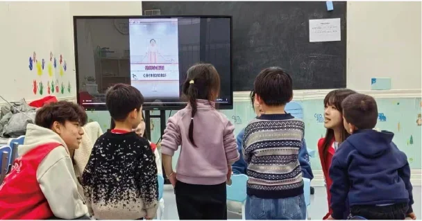 Club members participating in an activity with children